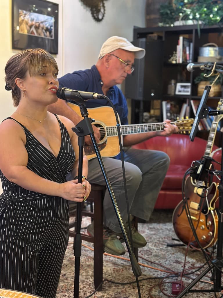 Lyndsey Hawkes singing and Zach MacDonald on guitar at Cafe 641 in Hudson, Massachusetts